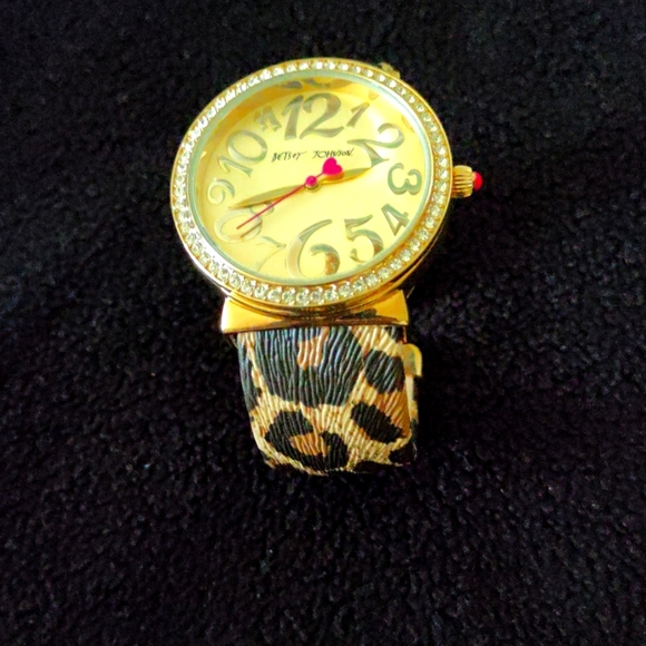 Betsey Johnson Accessories - Betsy Johnson leopard print bracelet watch. Has new battery